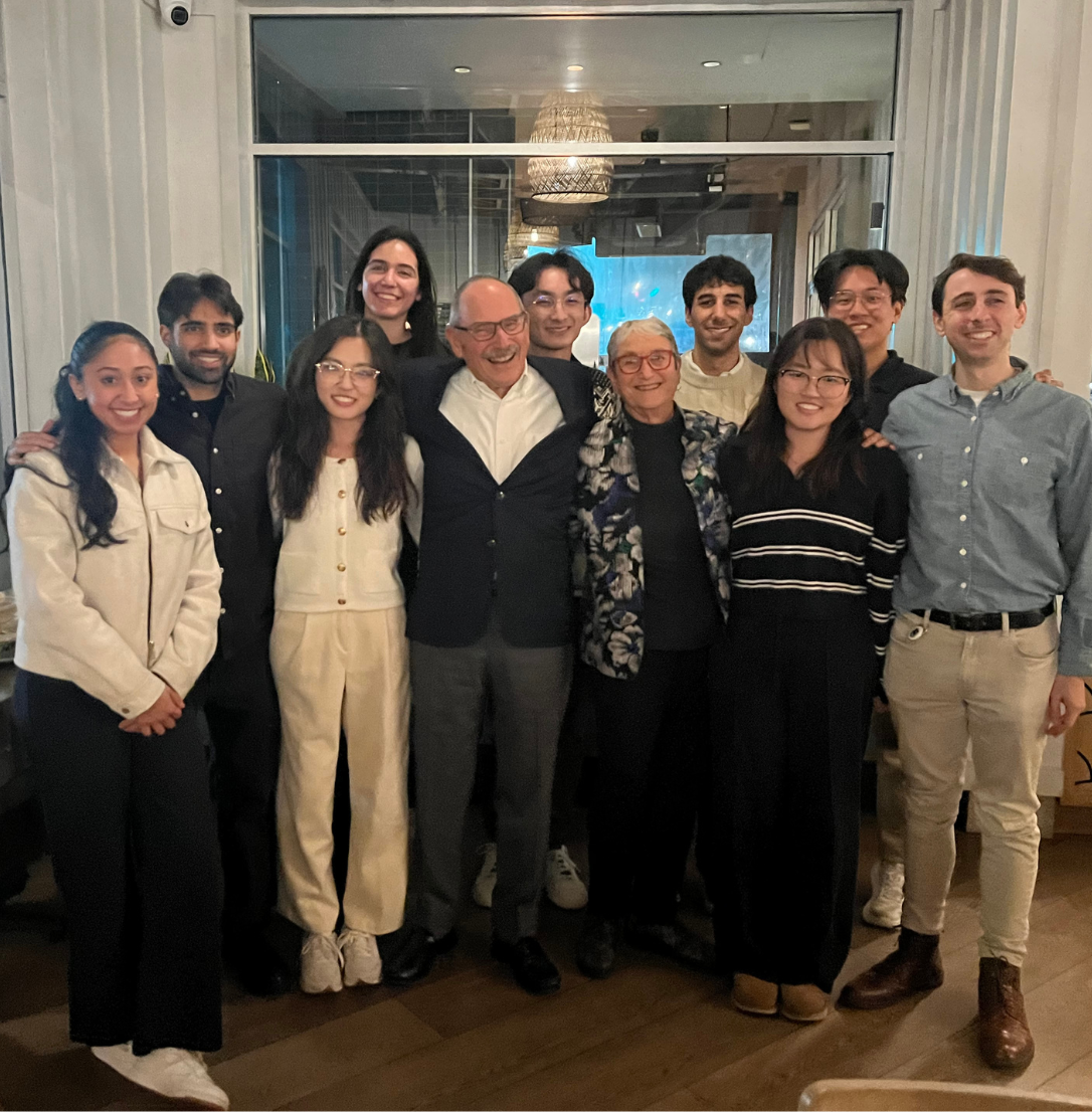 UCSF alum Peter Milgrom, DDS, at a dinner with UCSF School of Dentistry students